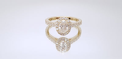 Custom Designed Oval Diamond Engagement Ring and Wedding Band Set for the Snellenburg's